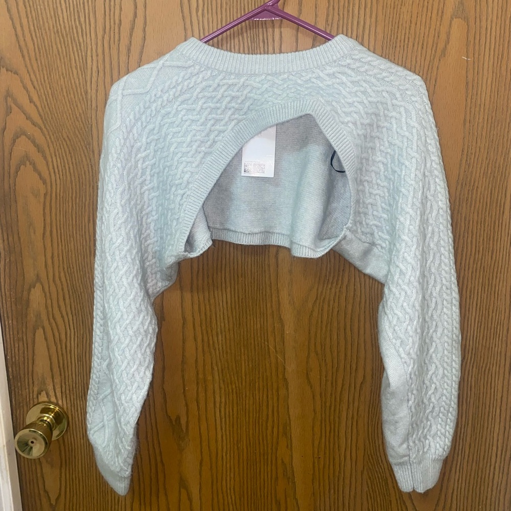 Cropped shoulder sweater